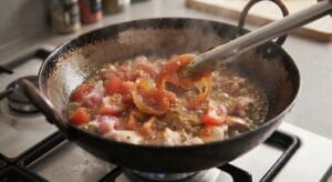 Thickening gravy and separating oil for Restaurant Style Chicken Karahi Recipe