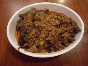 Delicious Masala Bharre Karele ready to serve in a wok with rich spices and tamarind twist